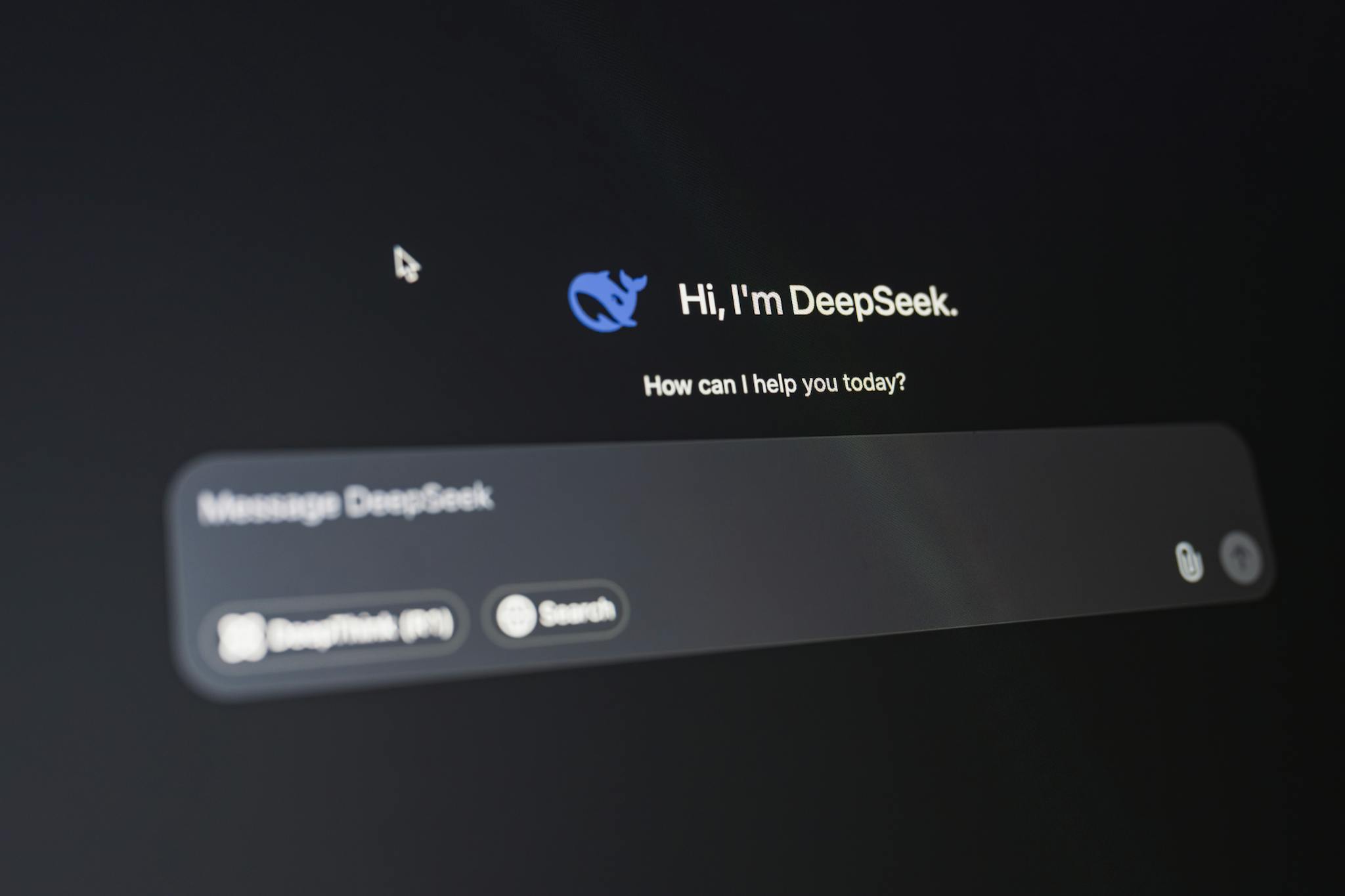 A detailed view of the DeepSeek AI interface, displaying a welcoming message on a dark background.